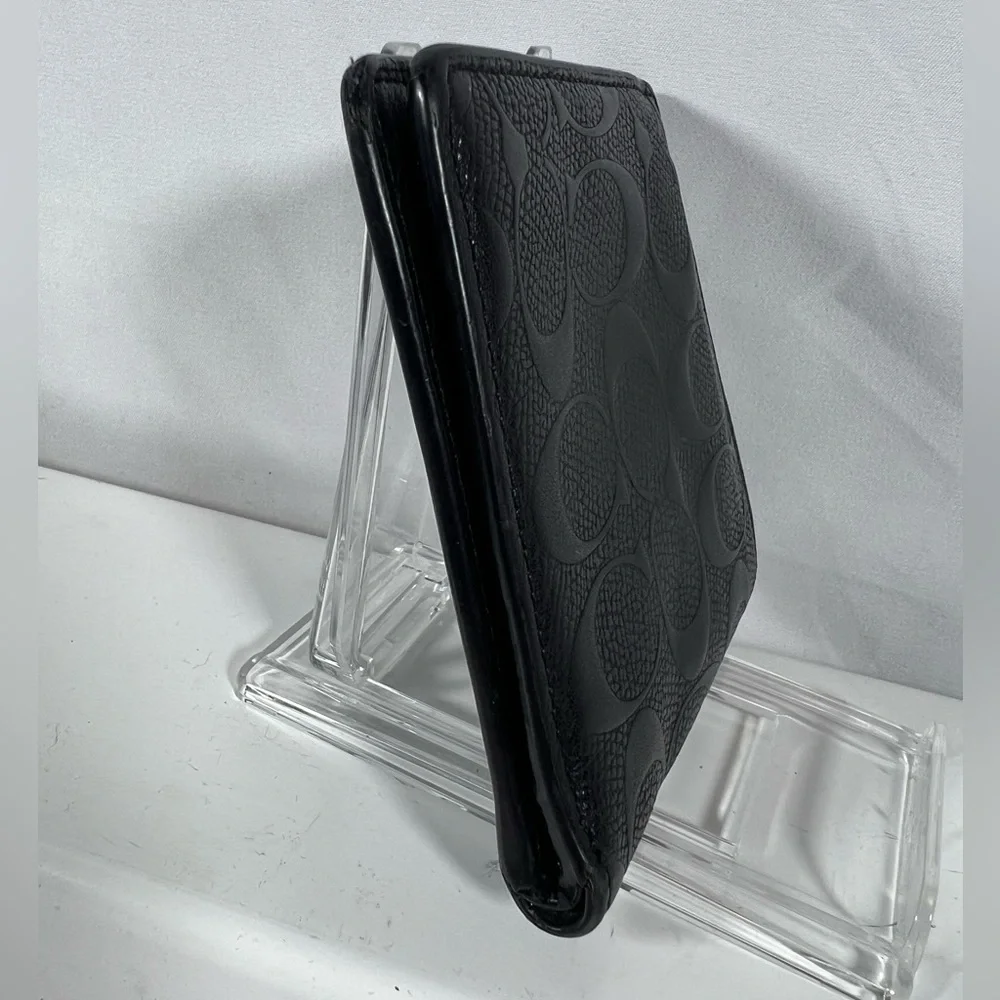 2100: Coach Black Signature Embossed Leather Bifold Wallet Men’s